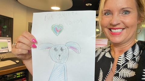 Britta Wiegand mit Kinderbild